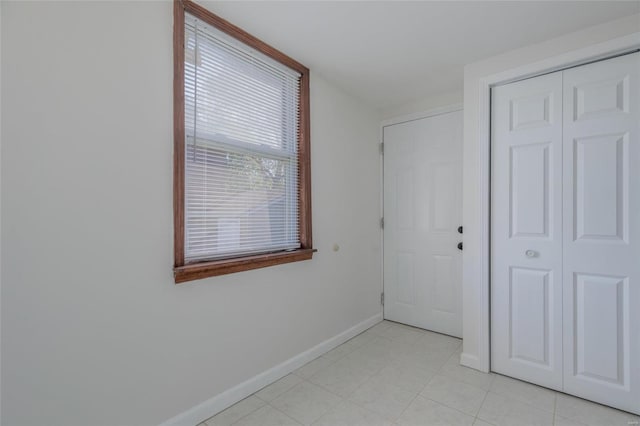 unfurnished bedroom featuring a closet