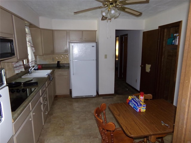 kitchen with black appliances, sink, ceiling fan, and decorative backsplash