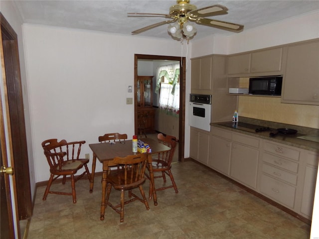 dining area featuring ceiling fan