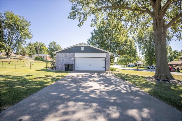 garage with a yard