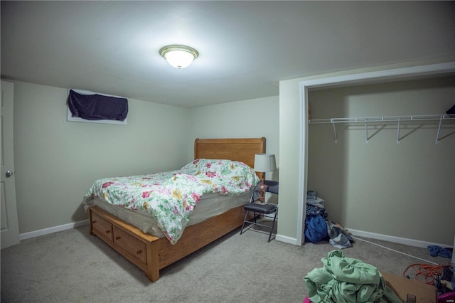 bedroom featuring a closet and carpet floors