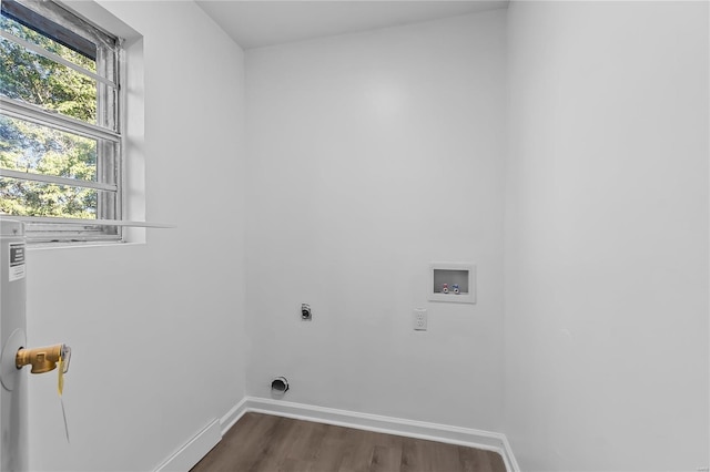 laundry room with dark wood-type flooring, electric dryer hookup, and hookup for a washing machine