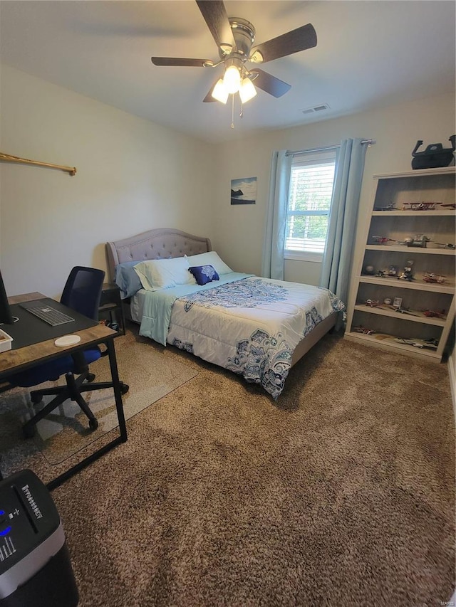 carpeted bedroom featuring ceiling fan