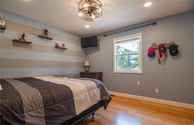 bedroom with light wood-type flooring