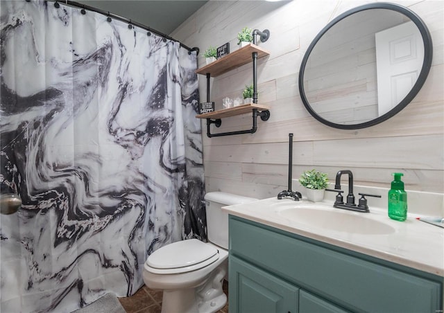 bathroom featuring vanity, toilet, and a shower with shower curtain