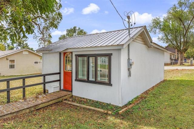 exterior space with a front yard