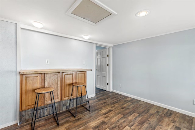 bar featuring dark hardwood / wood-style floors