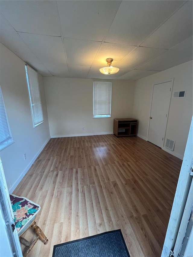 unfurnished living room with hardwood / wood-style floors