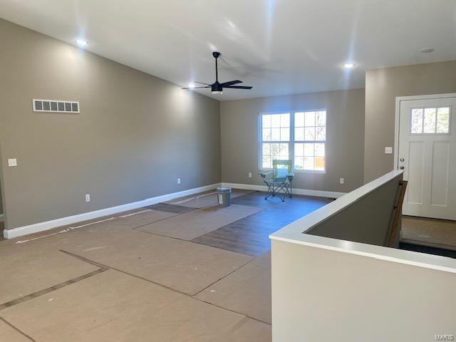 interior space with ceiling fan and a healthy amount of sunlight