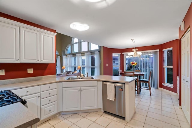 kitchen featuring dishwasher, kitchen peninsula, hanging light fixtures, white cabinetry, and light tile patterned floors