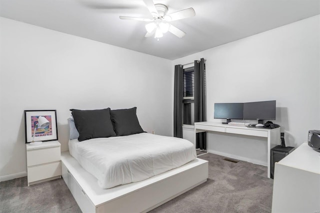 carpeted bedroom with ceiling fan