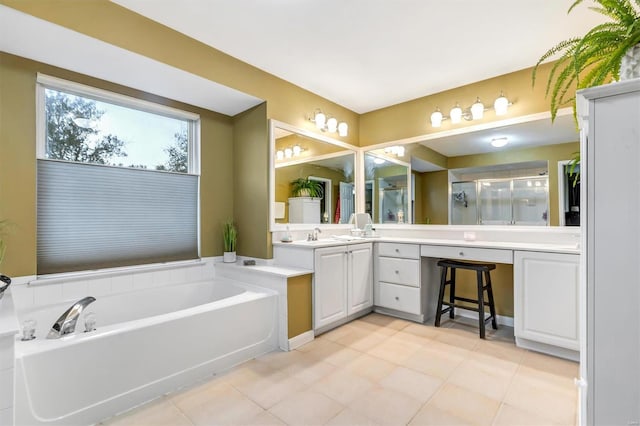 bathroom featuring vanity and separate shower and tub