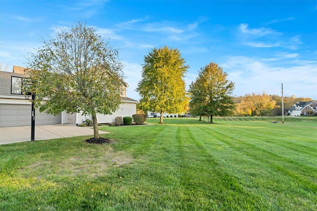 view of yard with a garage