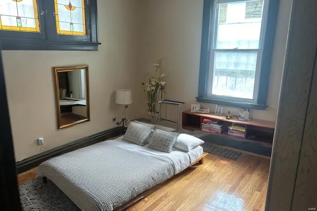 bedroom featuring hardwood / wood-style flooring