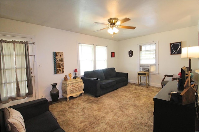 living room featuring carpet flooring and ceiling fan