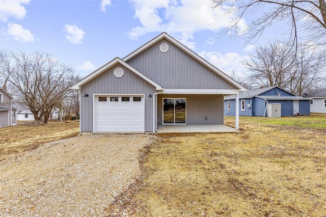 view of front of home featuring a garage and a front yard