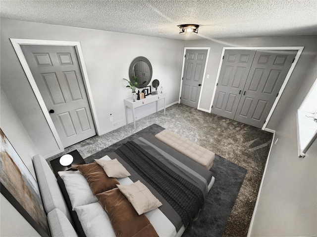 foyer with carpet flooring and a textured ceiling