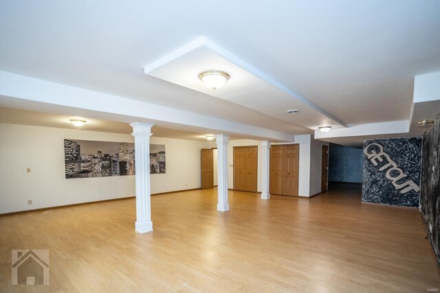 basement featuring wood-type flooring