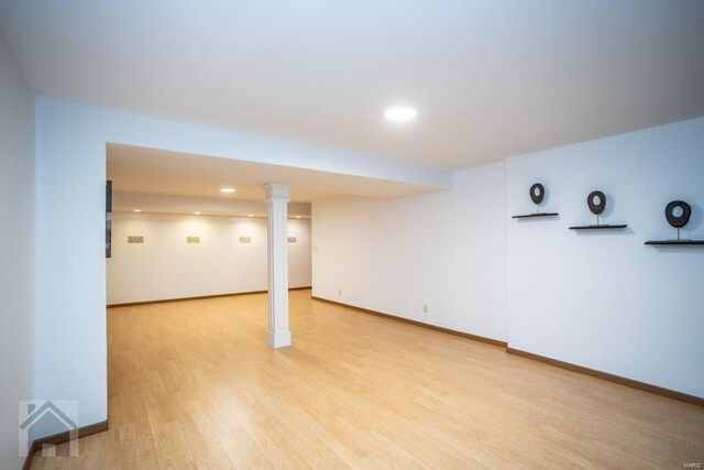 basement featuring light hardwood / wood-style floors