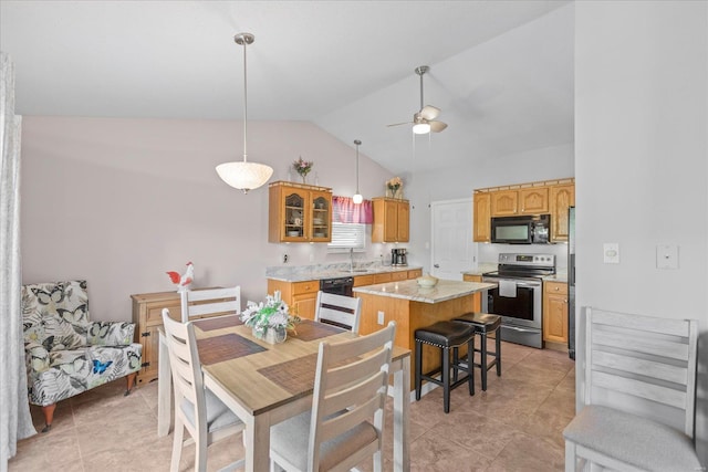 kitchen featuring dishwasher, electric stove, vaulted ceiling, ceiling fan, and a kitchen island