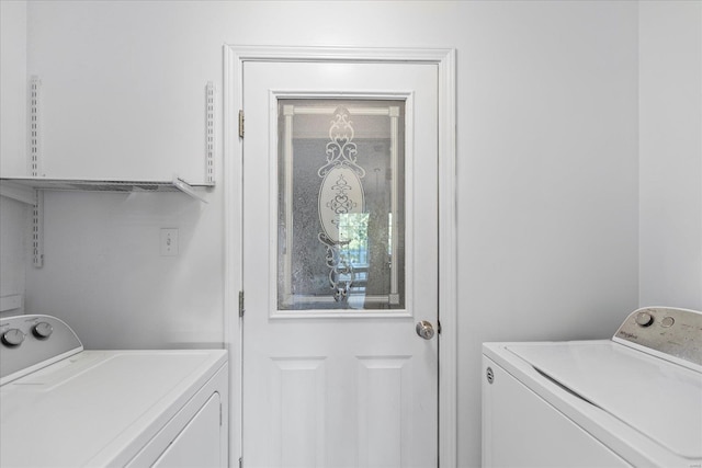 laundry room with washer and clothes dryer