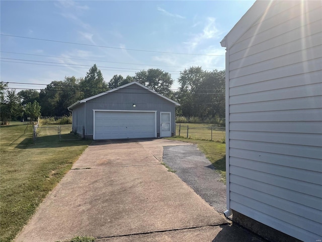 garage with a lawn