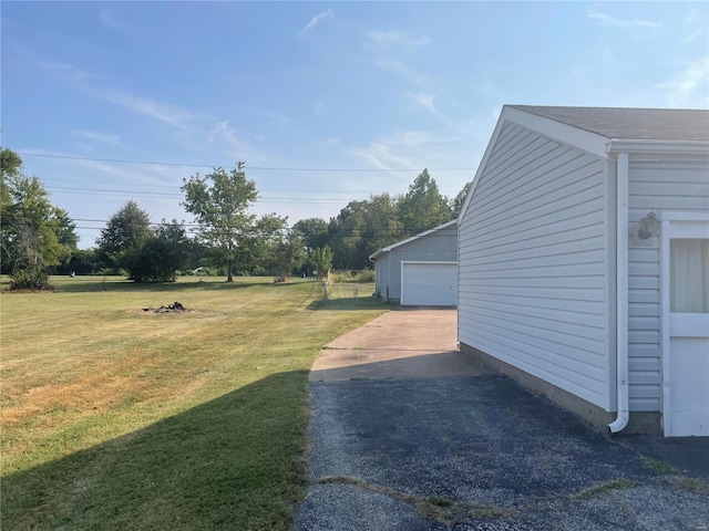 view of yard with a garage