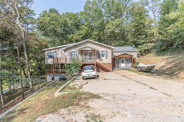 view of front of house with a wooden deck