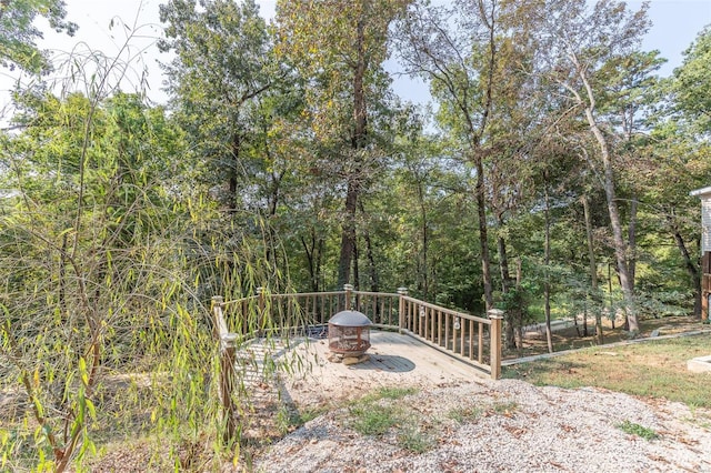 exterior space featuring an outdoor fire pit