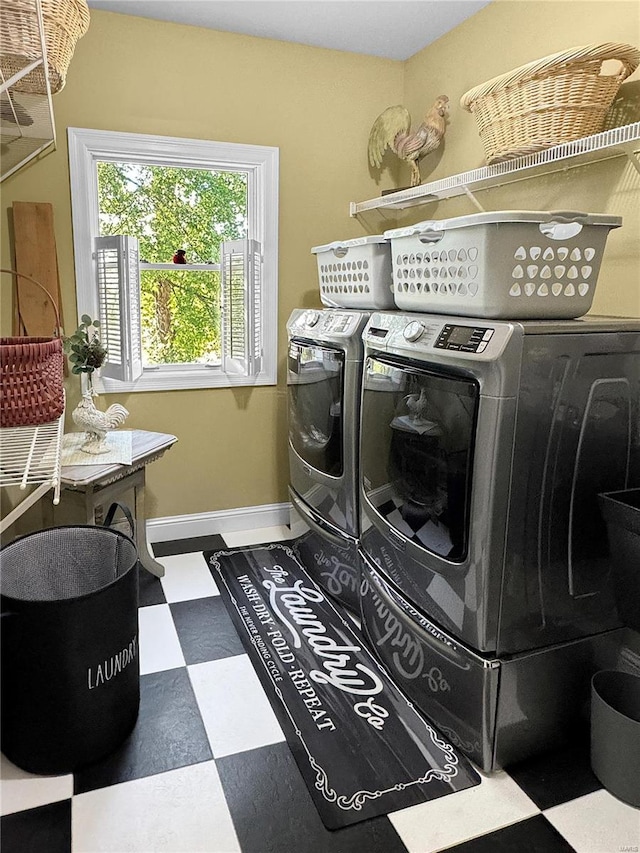 laundry area with washer and dryer