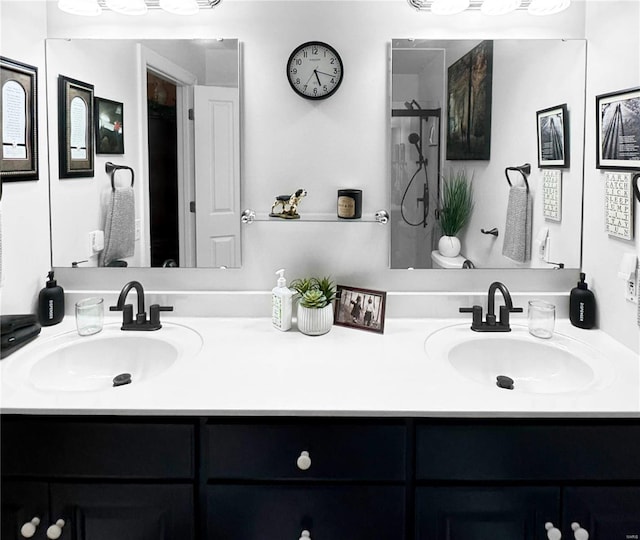 bathroom with vanity and an enclosed shower