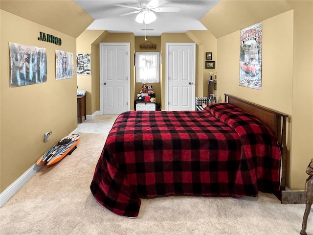 carpeted bedroom featuring ceiling fan