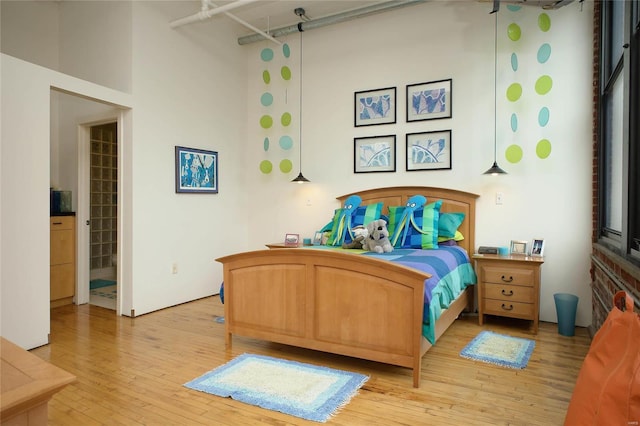 bedroom featuring light hardwood / wood-style flooring