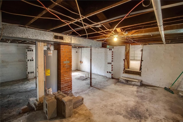 basement featuring gas water heater