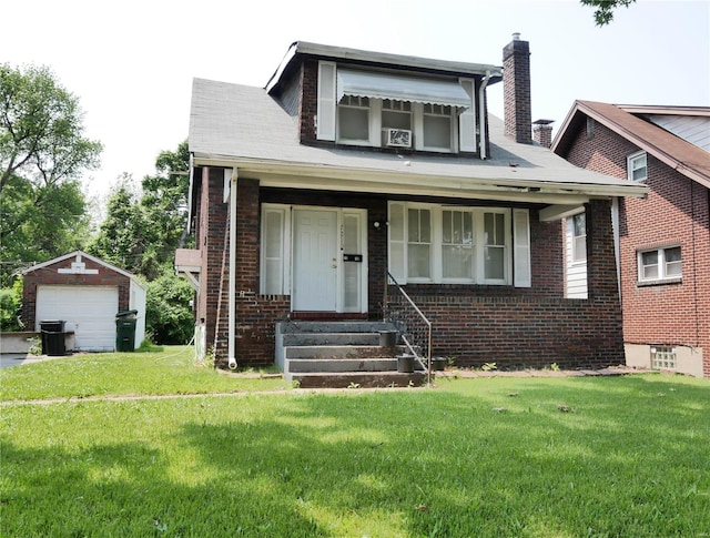 view of front of house with a front yard, a porch, an outbuilding, cooling unit, and a garage