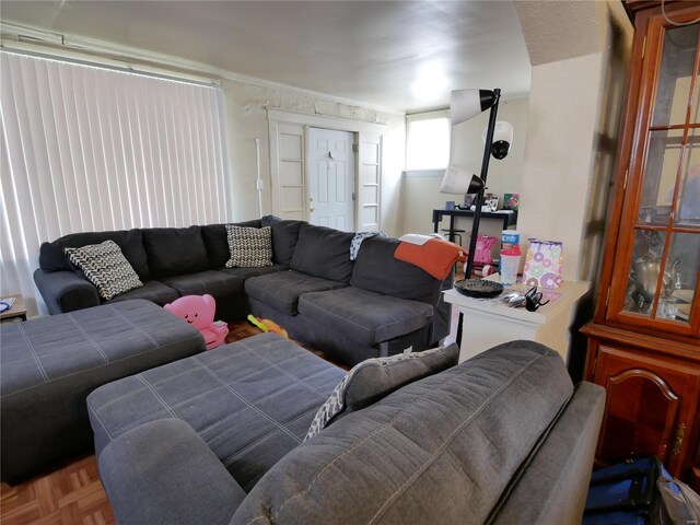 living room with parquet floors