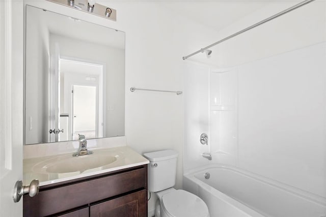 full bathroom featuring shower / bath combination, toilet, and vanity