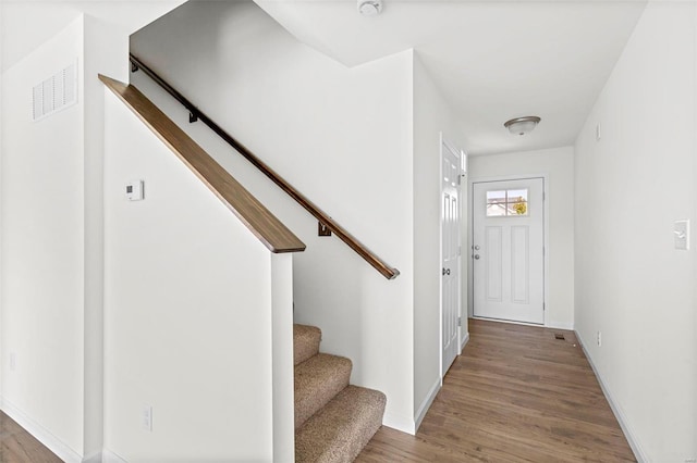 foyer entrance featuring hardwood / wood-style flooring