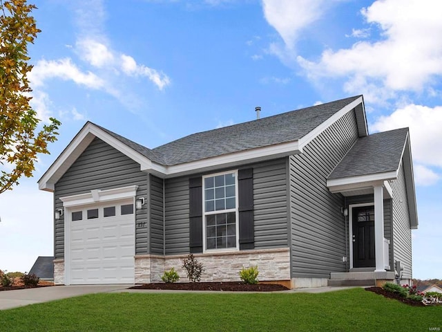 ranch-style house featuring stone siding, a front yard, a garage, and a shingled roof