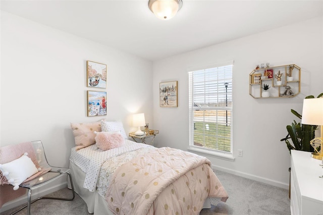 bedroom with light carpet