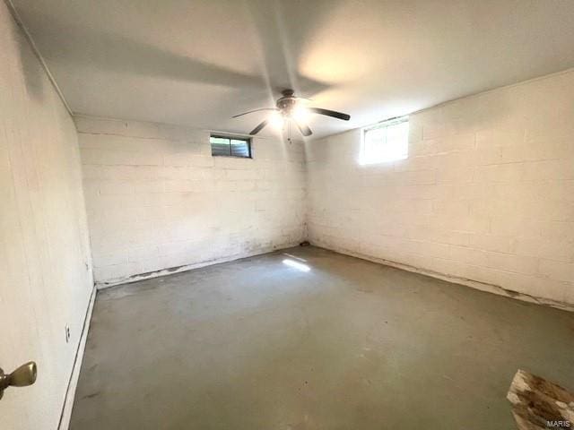 basement with ceiling fan