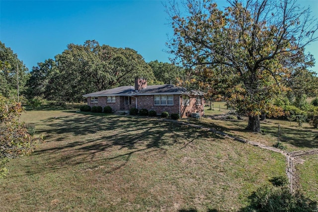 exterior space featuring a front lawn