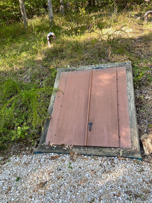 view of entry to storm shelter