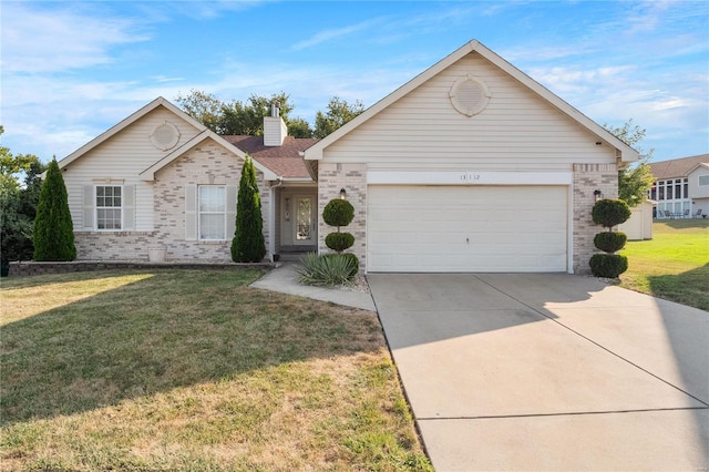 single story home with a garage and a front lawn