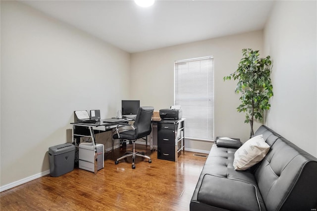 home office featuring wood-type flooring