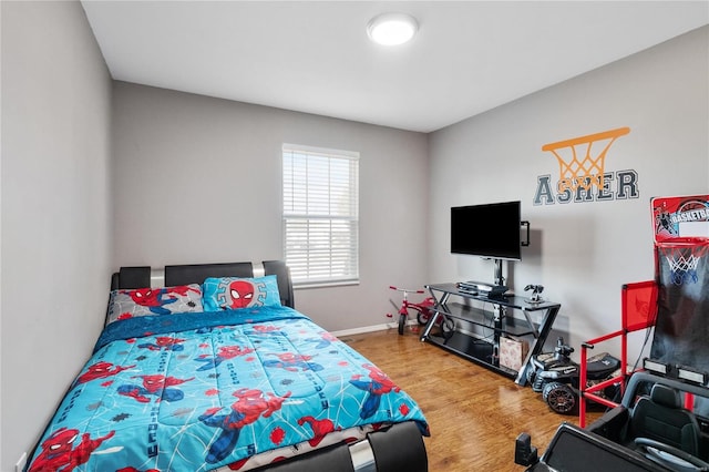 bedroom featuring hardwood / wood-style floors