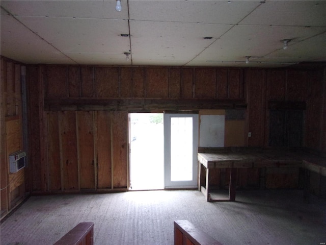 interior space featuring wood walls