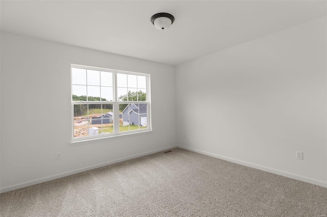 view of carpeted spare room