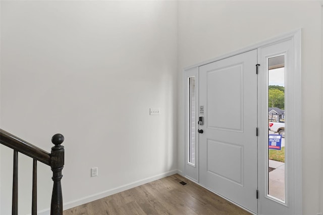 entryway with light hardwood / wood-style flooring