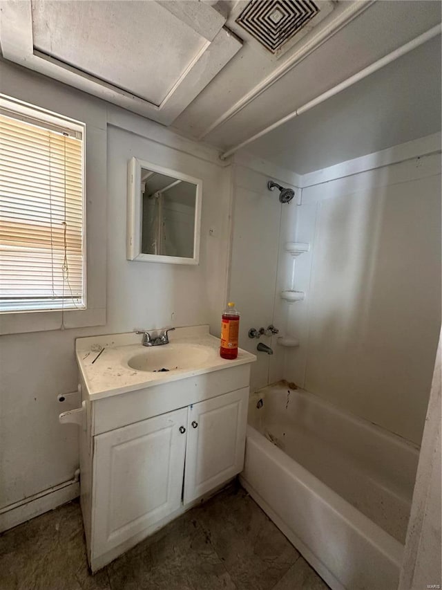 bathroom with bathtub / shower combination and vanity